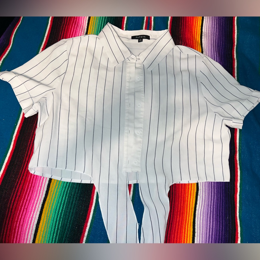 Pinstripe, tailored tie-front crop blouse.